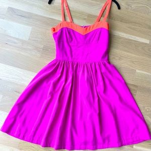 Fuchsia dress with orange detail. Size M.